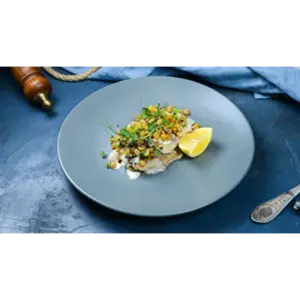 Треска запеченная с кукурузой под сливочным соусом